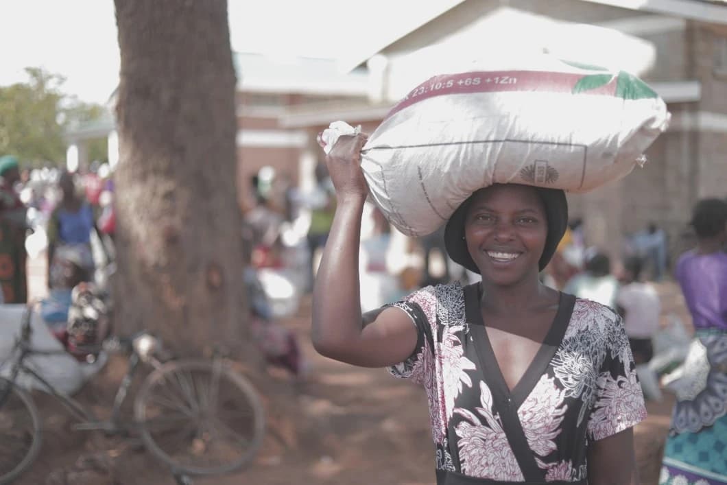 Farmer carrying sack